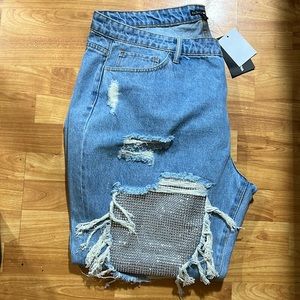 Woman’s fashion nova distressed bling jeans